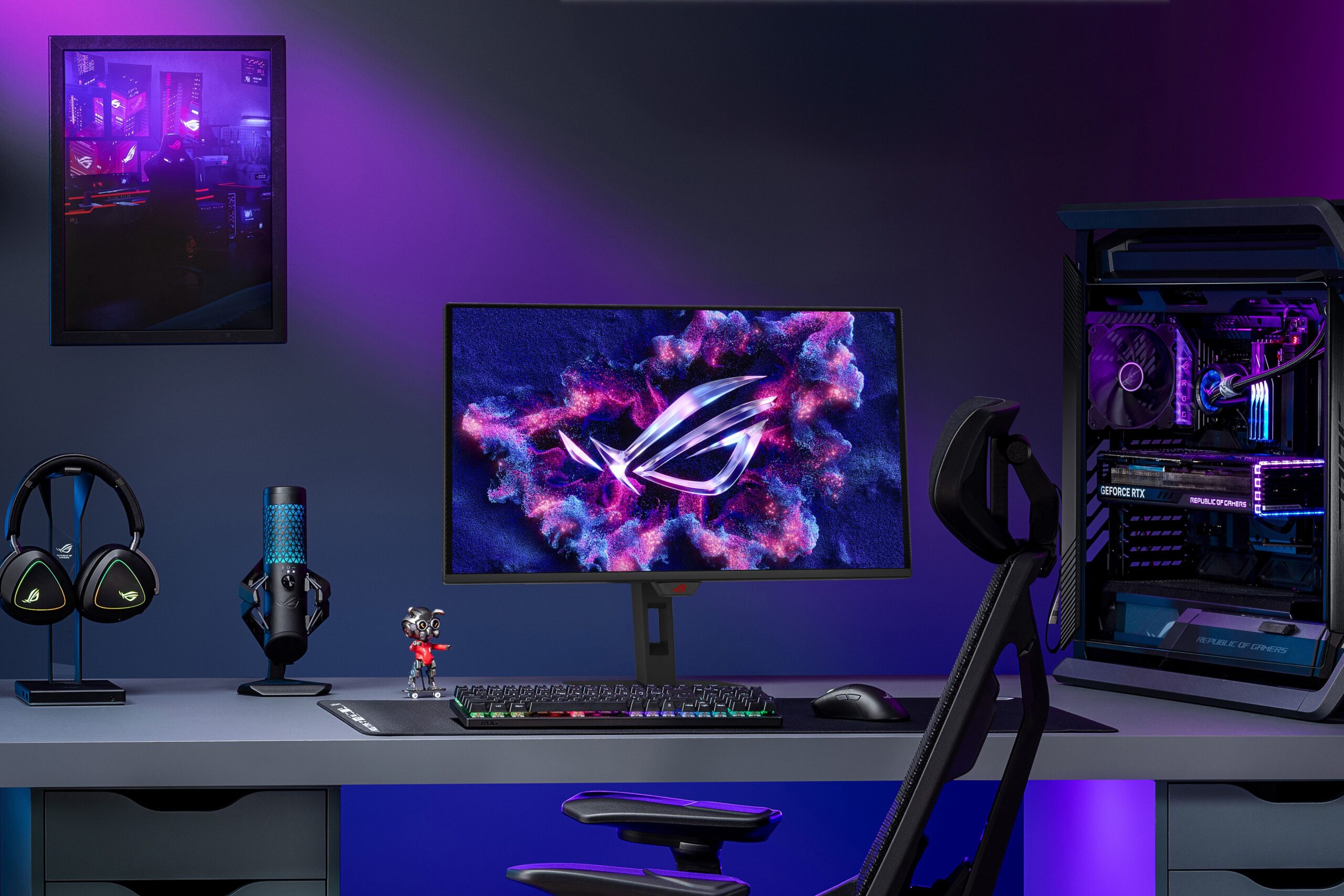Asus ROG Strix OLED gaming monitor in a desktop gaming setup